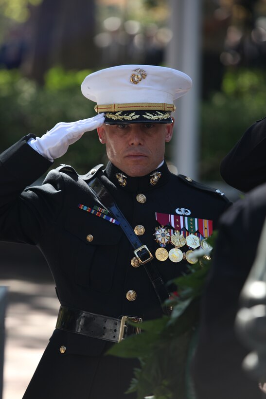 Col. Daniel J. Lecce, commanding officer of Marine Corps Base Camp Lejeune, renders a salute in the laying of the wreaths ritual during the commemoration of the 24th annual Beirut Memorial Observance Ceremony, held at the Beirut Memorial, Jacksonville, N.C., Oct. 23. The ceremony is held annually as tribute to the Marines, sailors and soldiers who lost their lives at the 1983 Beirut barracks bombing, and for the city of Jacksonville and Marine Corps Base Camp Lejeune to renew their oath to ‘never forget.’