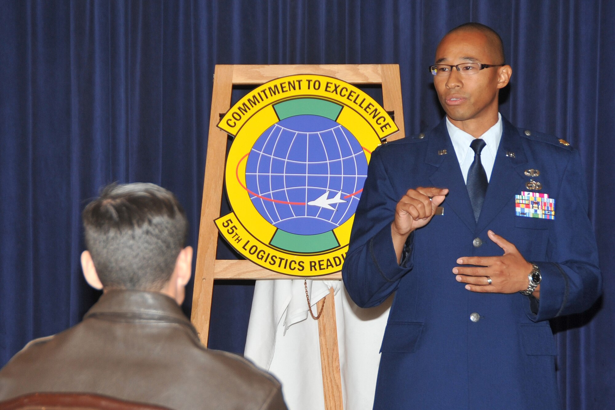 OFFUTT AIR FORCE BASE, Neb. - Maj. Melvin E. Maxwell Jr. the 55th Logistics Readiness Squadron's first commander, addresses the crowd at his assumption of command ceremony Sept. 22. The new unit replaces and consolidates several existing functions from around the base including supply, transportation, fuels and readiness flights to synchronize their interdependent processes under a single authority. 