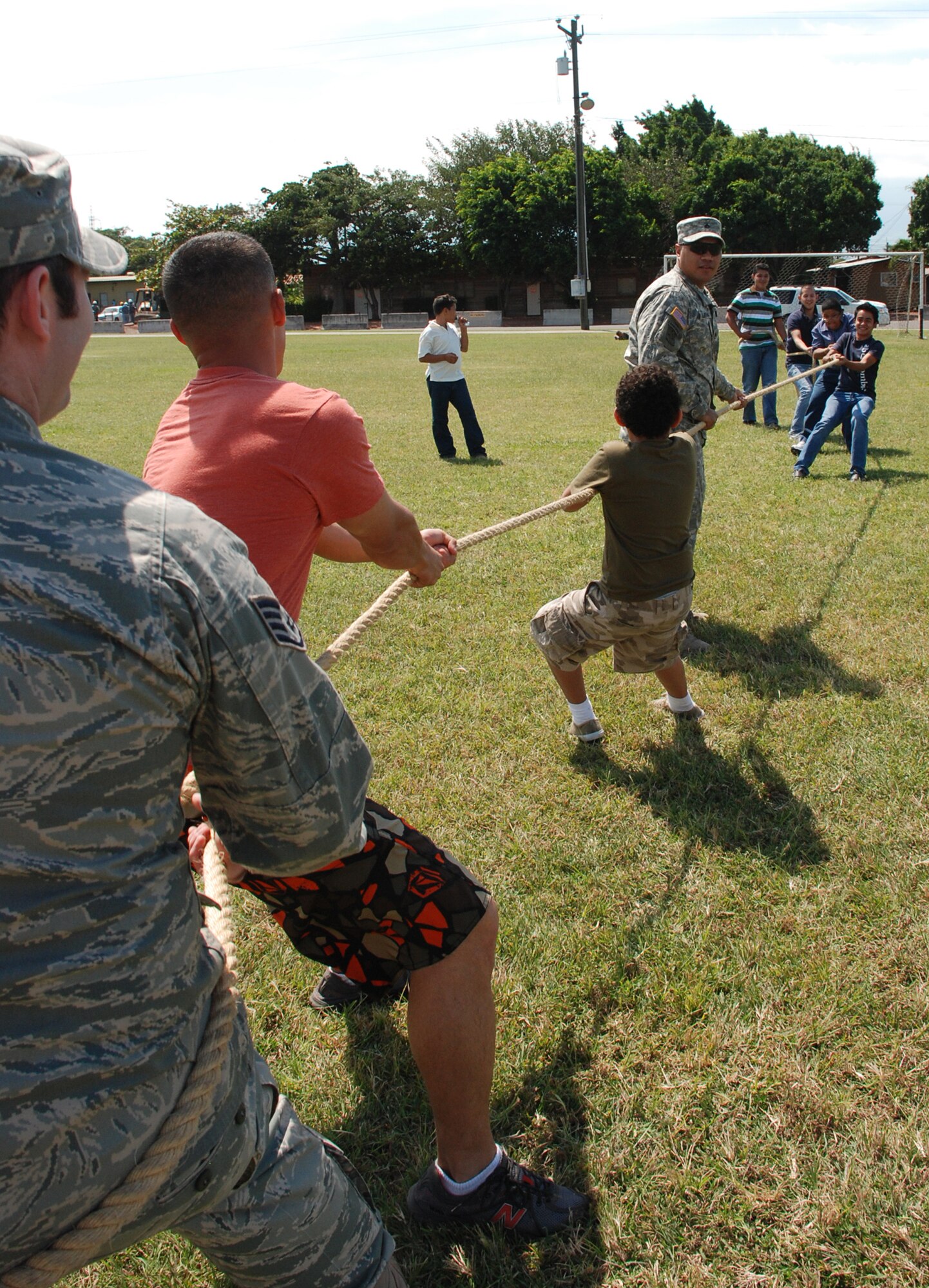 SOTO CANO AIR BASE, Honduras --  U.S. servicemembers, foreign service nationals and their family members participate in a tug-of-war game during FSN Family Day here Oct. 22. FSNs and their family members were treated to a base tour, as well as lunch and games during the day's festivities. (U.S. Air Fore photo/Capt. John Stamm)