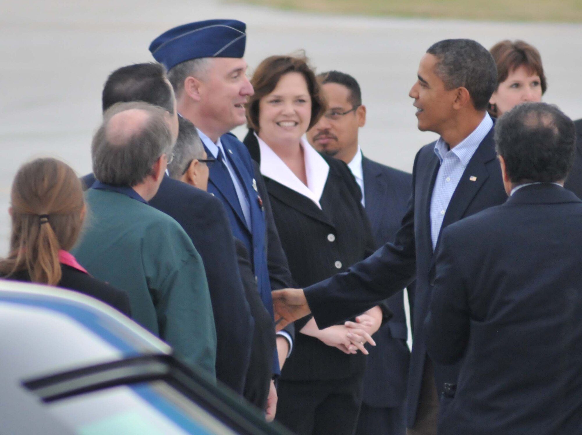 Col. Darrell G. Young, 934th Airlift Wing commander, greets President Barack Obama as he steps off Air Force One at the 934th Airlift Wing Oct. 23. (Air Force Photo/Master Sgt. Paul Zadach)