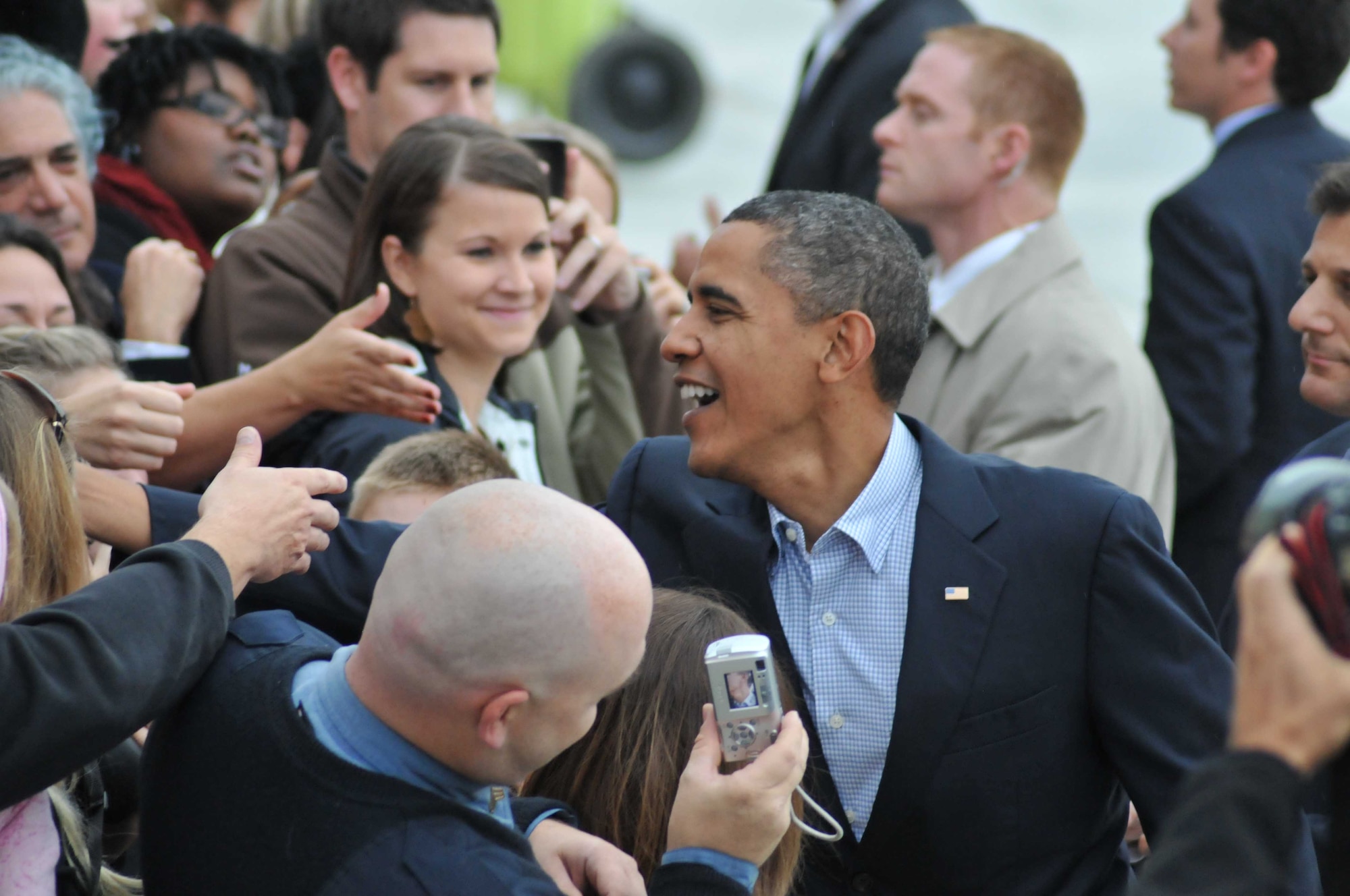 President Barack Obama is greeted by well wishers at the 934th Airlift Wing Oct. 23 on his way to a rally at the University of Minnesota. (Air Force Photo/Master Sgt. Paul Zadach)