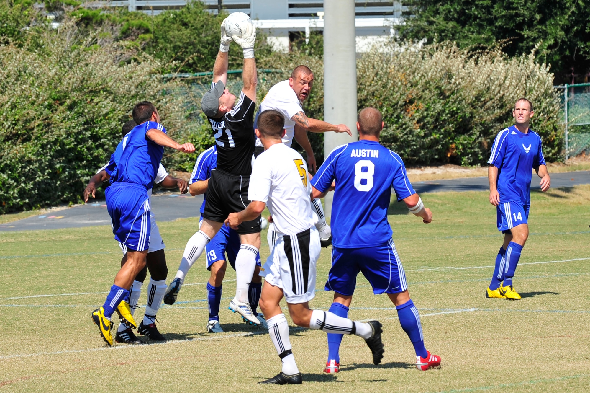 U.S. Air Force Maj. Thomas Butler, goalie for the Air Force soccer team, catches the ball during an Armed Forces Men's Soccer Championship Semifinal match against the U.S. Army at Morgan Sports Complex, Destin, Fla., Oct. 23, 2010. The Armed Forces Championships are conducted by the Armed Forces Sports council for the purpose of promoting, understanding, goodwill, and competition among the Armed Services. Major Butler is stationed at Robbins AFB, Ga. (DoD Photo by Staff Sgt. Stephanie Jacobs/RELEASED)

