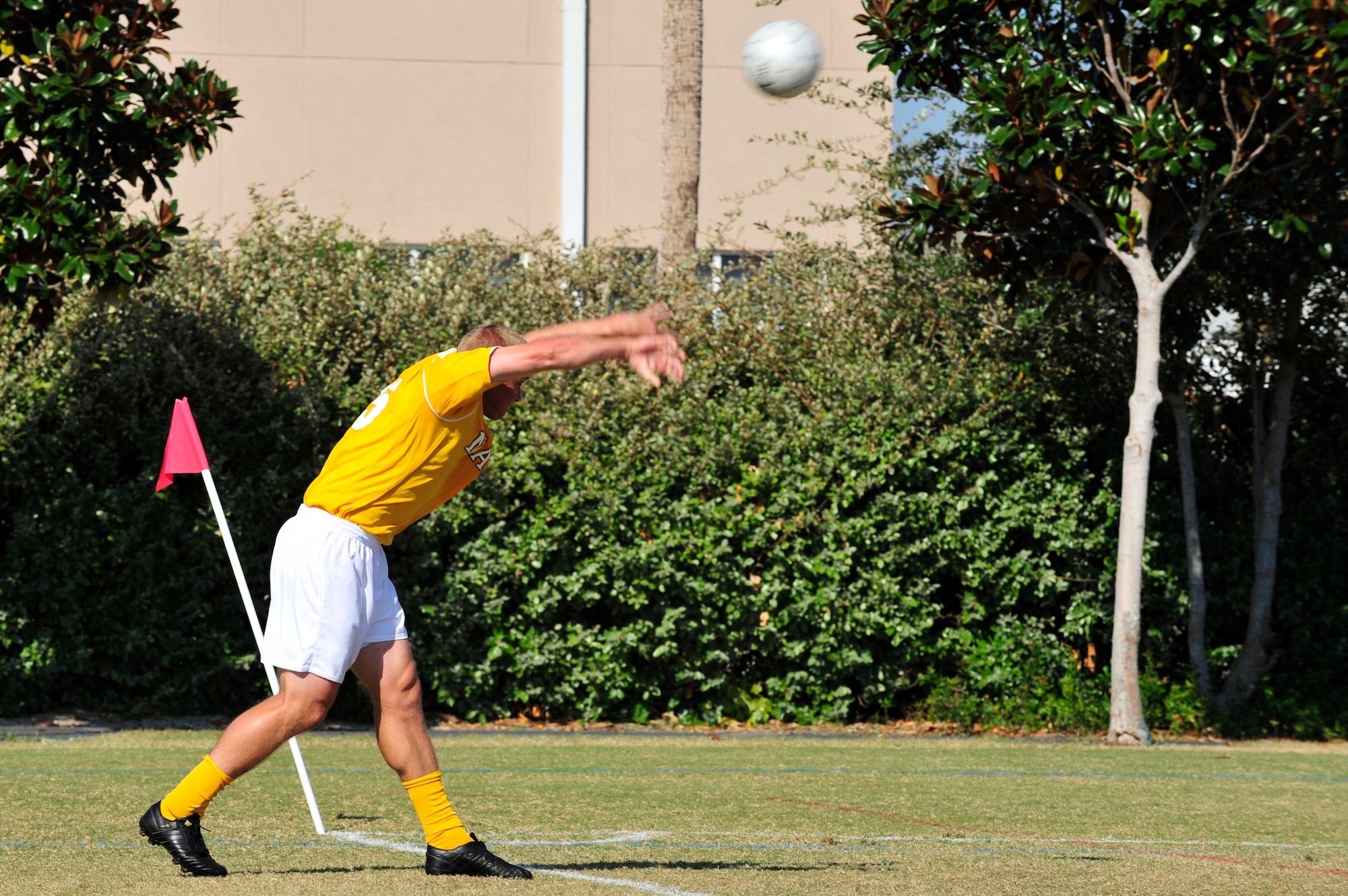 U.S. Navy Lt. Michael Tuddenham, a defender on the Navy soccer team, throws in a ball during an Armed Forces Men's Soccer Championship Semifinal match against the U.S. Marine Corps at Morgan Sports Complex, Destin, Fla., Oct. 23, 2010. The Armed Forces Championships are conducted by the Armed Forces Sports council for the purpose of promoting, understanding, goodwill, and competition among the Armed Services. Lieutenant Tuddenham is assigned to the Defense Distribution Depot, Susquehanna, Pa. (DoD Photo by Staff Sgt. Stephanie Jacobs/RELEASED)


