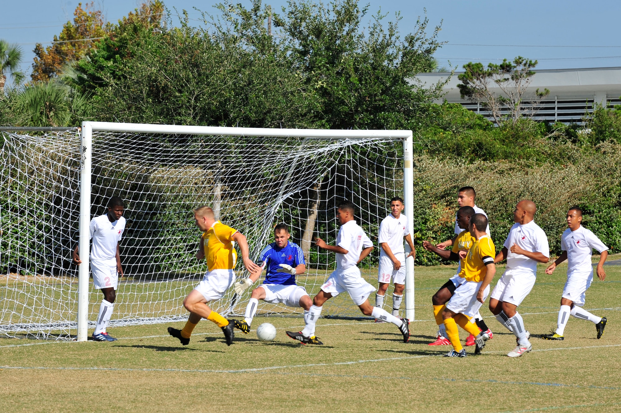 U.S. Marine Corps Sgt. Augin Gagner, goalie for the Marines soccer team, defends his goal during an Armed Forces Men's Soccer Championship Semifinal match against the U.S. Navy at Morgan Sports Complex, Destin, Fla., Oct. 23, 2010. The Armed Forces Championships are conducted by the Armed Forces Sports council for the purpose of promoting, understanding, goodwill, and competition among the Armed Services. (DoD Photo by Staff Sgt. Stephanie Jacobs/RELEASED)
