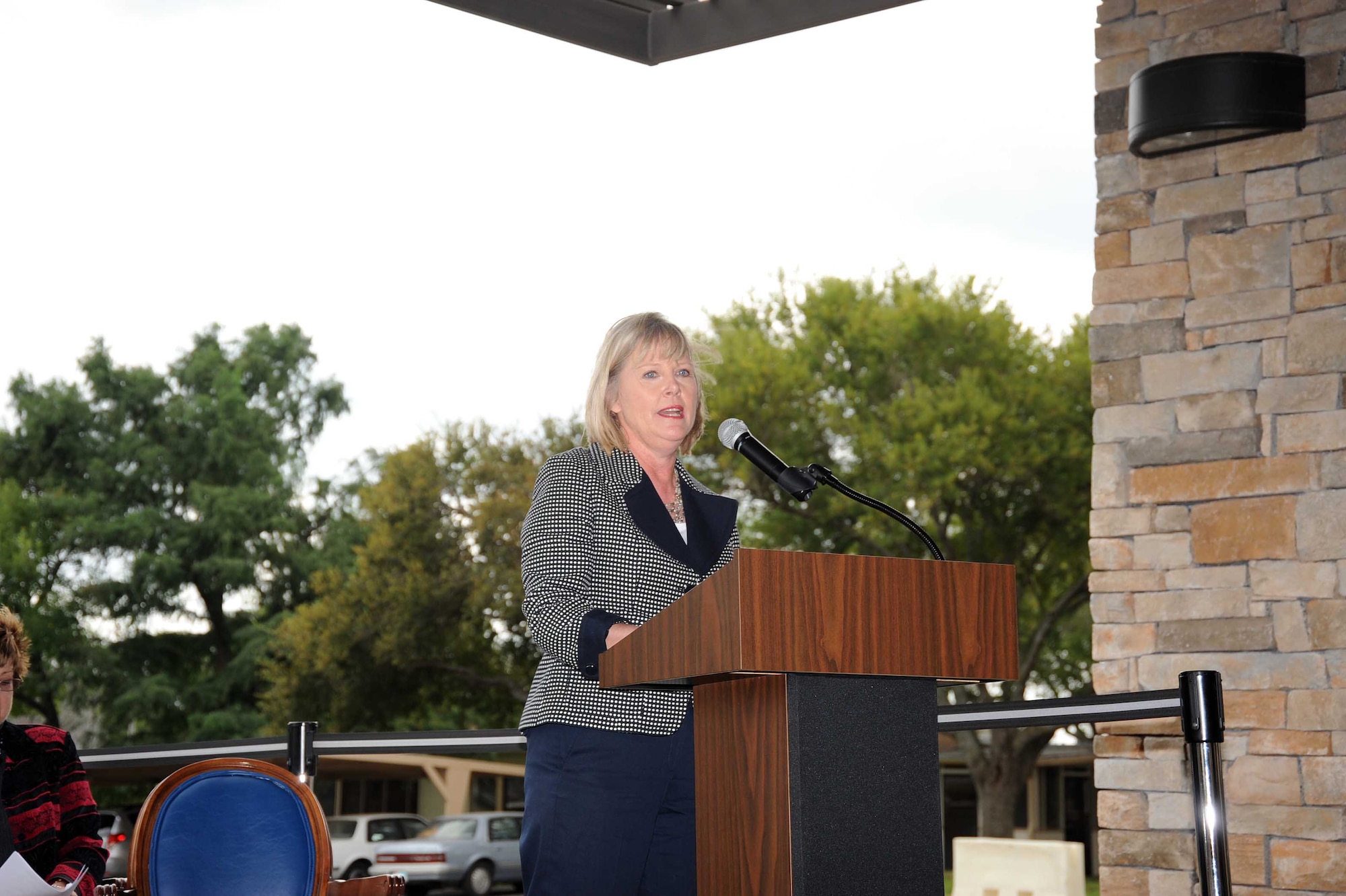 Suzie Schwartz speaks at the Air Force Village I rededication ceremony in San Antonio on Oct. 22, 2010. The Air Force Villages are a San Antonio-based community for America's retired military officers and spouses. Earlier that day, Mrs. Schwartz, the wife of Air Force Chief of Staff Gen. Norton Schwartz, toured Air Force Village I, which has undergone a massive re-construction project to modernize and update the facility. (Air Force photo)