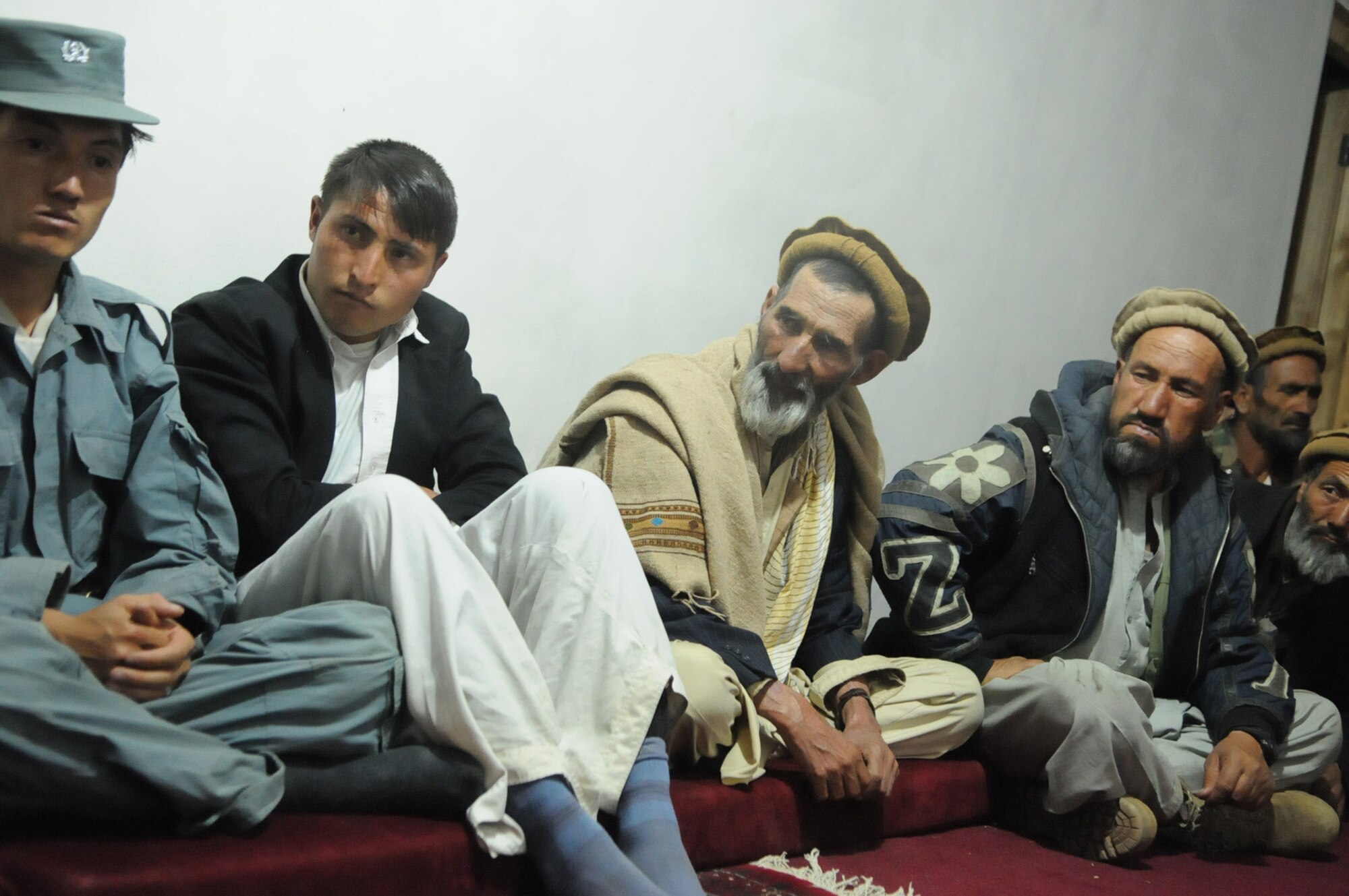 PANJSHIR PROVINCE, Afghanistan ? Elders from the remote village of Astana hold a meeting with members of Panjshir Provincial Reconstruction Team, Oct. 6.  Several of the topics discussed were winter preparation, watershed and their access to medical treatment.  Members of Provincial Reconstruction Team Panjshir hiked to the remote village of Astana to deliver winter coats and to talk to village elders about any other issues the village may be experiencing.  (USAF Photo by: Tech Sgt Sean Mateo White, PRT Panjshir photographer)(released)