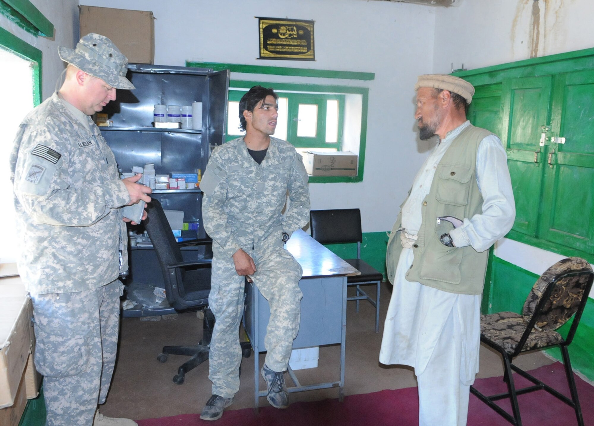 PANJSHIR PROVINCE, Afghanistan ? U.S. Air Force Capt. Michael Calnicean, Panjshir Provincial Reconstruction Team chief medical officer from Detroit, Mich., tours Astana Village?s medical clinic, Oct. 6.  This single-room clinic is the only medical facility within a 12-kilometer radius of the village and serves a total of eight villages. Members of the Panjshir PRT hiked more than 12 kilometers in order to deliver humanitarian aid and meet with the village elders.  (USAF Photo by: Tech Sgt Sean Mateo White, PRT Panjshir photographer)(released)
