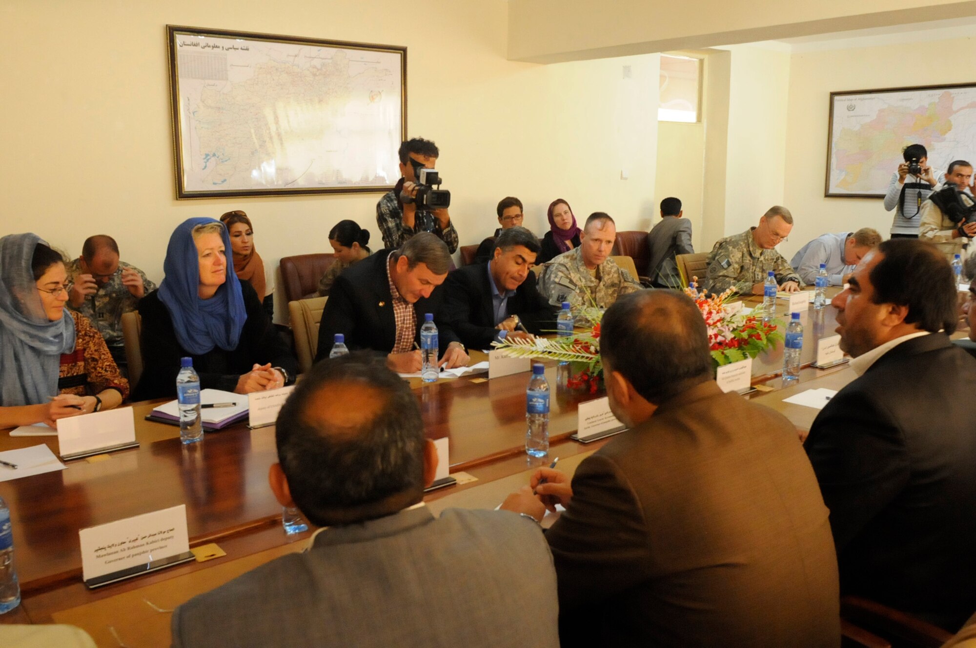 Karl Eikenberry, the U.S. Ambassador to Afghanistan; U.S. Army Lt. Col. Jay Briggs, Panjshir Provincial Reconstruction Team commander; and Elizabeth Smithwick, U.S. Agency for International Development lead field officer at Panjshir PRT and acting Panjshir PRT director, discuss various provincial issues with Panjshir Provincial Governor Keramuddin Keram Oct. 7. Ambassador Eikenberry visited the province to meet with the Panjshir PRT and provincial government officials. (U.S. Air Force Photo by Tech. Sgt. Sean White, Panjshir PRT Public Affairs Photographer)
