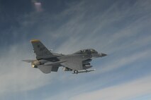 Republic of Korea Air Force Brig. Gen. Jung Jaebu, Air Force Operations Command vice commander, back, and Capt. Joseph Miranda, 80th Fighter Squadron, fly an F-16 Fighting Falcon from Kunsan Air Base, ROK, Oct. 21 during exercise Max Thunder 10-02. (U.S. Air Force photo/Master Sgt. Jason Wilkerson)