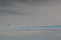F-16 Fighting Falcon aircraft fly a sortie in the western airspace over the Korean Peninsula Oct. 21 during exercise Max Thunder 10-02. (U.S. Air Force photo/Master Sgt. Jason Wilkerson)