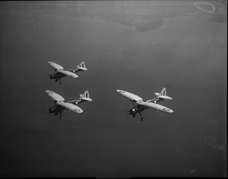 Three O-46A aircraft assigned to the Maryland National Guard's 104th Observation Squadron fly over the Chesapeake Bay June 25, 1938. The 104th flew O-46s from February 1937 to June 1941. (Released)