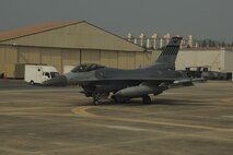 An F-16 Fighting Falcon aircraft assigned to the 36th Fighter Squadron at Osan Air Base, Republic of Korea, taxis to the runway Oct. 21 at Kwangju AB, ROK during exercise Max Thunder 10-2. (U.S. Air Force photo/Master Sgt. Jason Wilkerson)