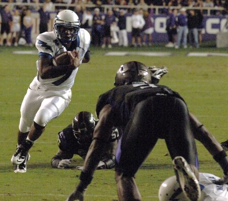 Air Force quarterback Tim Jefferson breaks into the open en route to a 16-yard touchdown run against TCU at Amon G. Carter Stadium in Fort Worth Oct. 23, 2010. Jefferson had nine carries for 39 yards and Air Force's only touchdown of the game in the 38-7 loss. (U.S. Air Force photo/John Van Winkle)