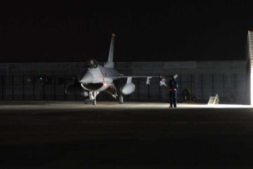 An F-16 Fighting Falcon from Kunsan Air Base, Republic of Korea, prepares to taxi to the runway for a Max Thunder 10-2 night mission Oct. 20 at Kwangju AB, ROK. (U.S. Air Force photo/Staff Sgt. Eric Burks)