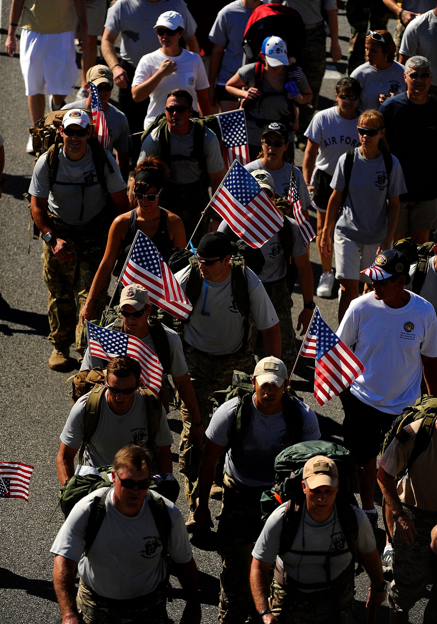Surviving family members, a few wounded Airmen and members of the Air Force Special Operations Command, join fifteen Special Tactics Airmen on the final stretch of an 860-mile memorial march from San Antonio, Tex. to Hurlburt Field, Fla., Sept. 21, 2010. (U.S. Air Force Photo by Master Sgt. Russell E. Cooley IV/Released)