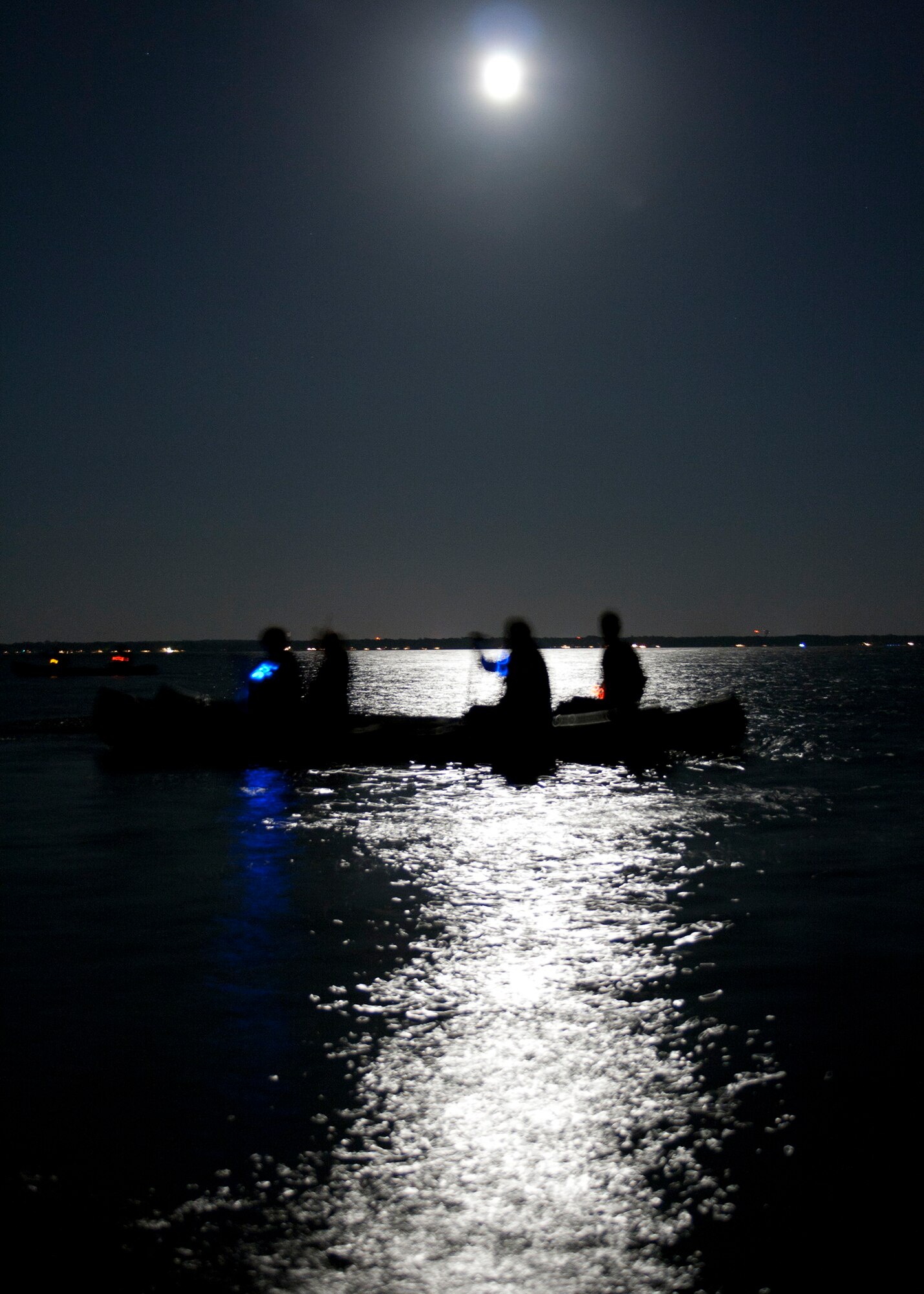 EGLIN AIR FORCE BASE, Fla. - Boaters from the 53rd Wing enjoy a "Full Moon Paddle" canoe ride along Eglin’s Post’l Point Oct. 23. The 96th Force Support Squadron's Outdoor Recreation began hosting this event for the Fall season. Go to www.EglinForceSupport.com for more information, or call Eglin Outdoor Recreation at 882-5058. (U.S. Air Force photo/2nd Lt. Andrew Caulk.)