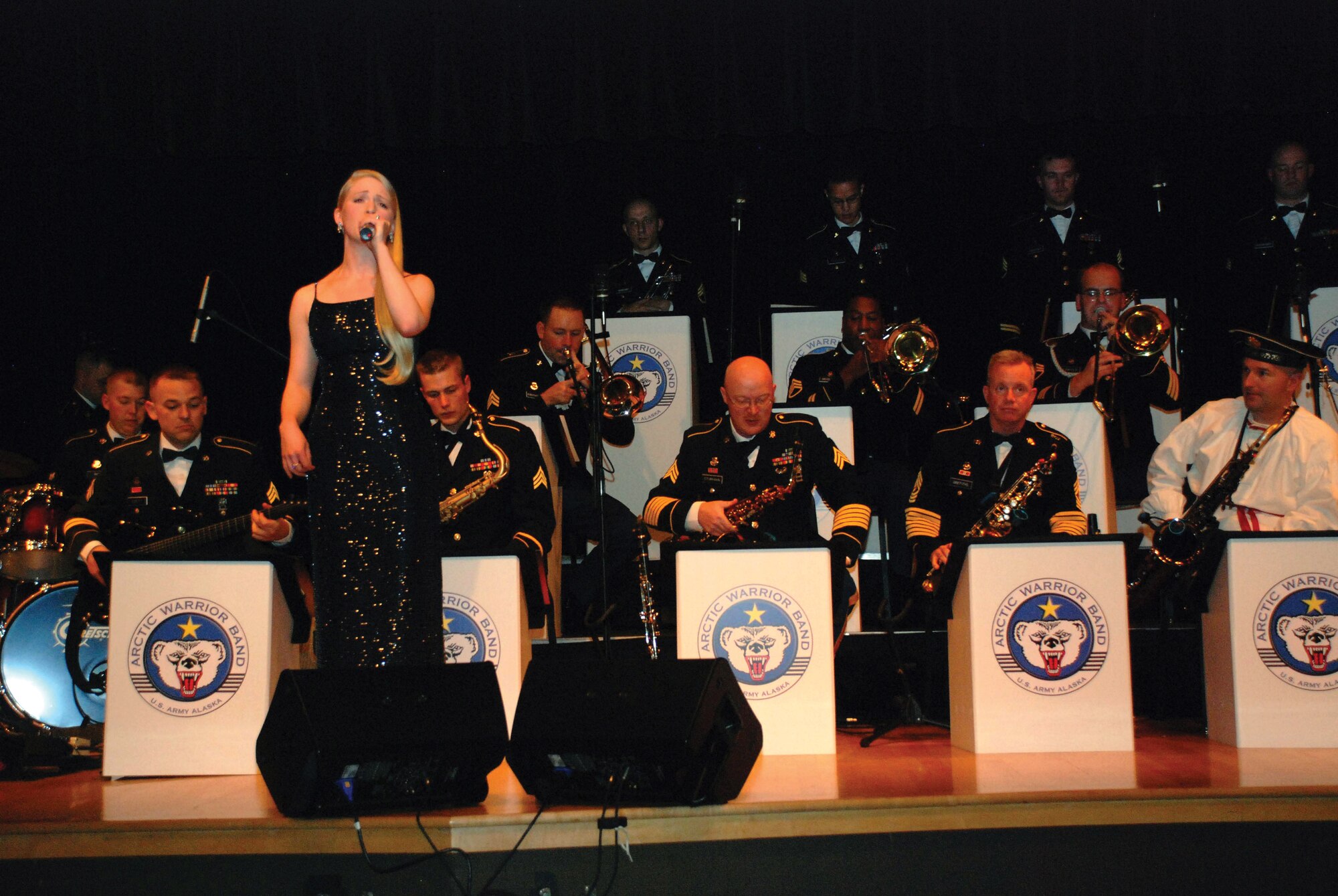 Ninth Army Band vocalist Sgt. Amy Mahoney performs at the Alaska Day Ball Saturday in Sitka. (U.S. Army photo/Mary Rall)