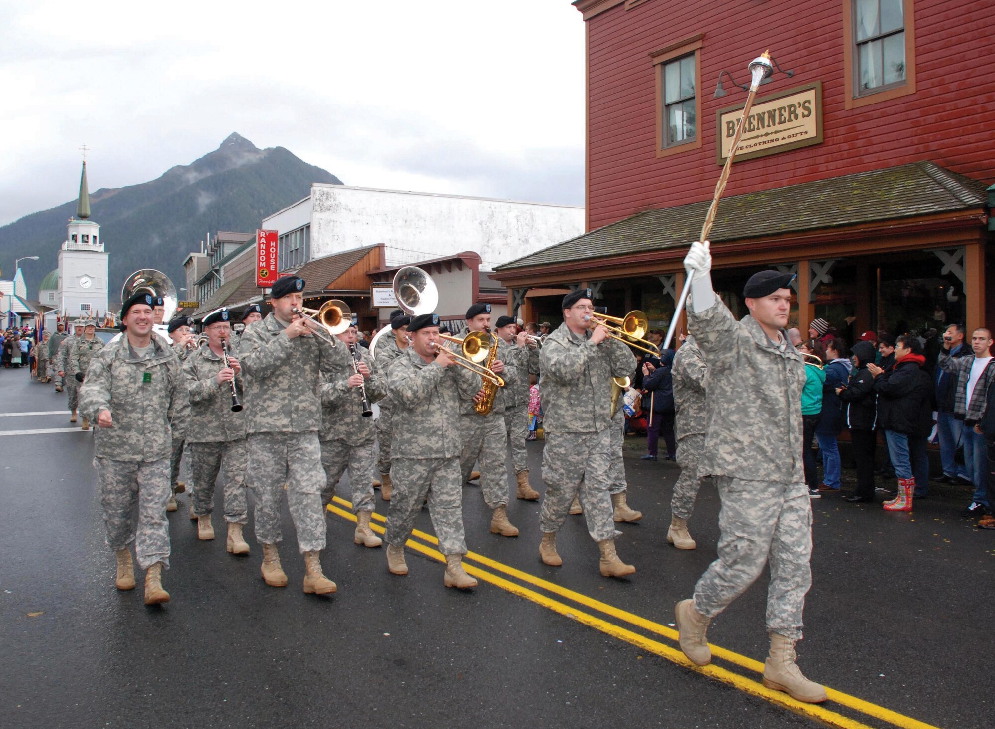 The 9th Army Band marches through downtown Sitka Monday during the annual Alaska Day Parade. (U.S. Army photo/Mary Rall)