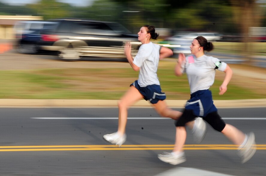 BARKSDALE AIR FORCE BASE, La. – Participants in the 14th Annual Celebrate Barksdale 5K sprint to the finish line outside the fitness center Oct. 22. The event is hosted by the Military Affairs Council every year to show appreciation to the men and women of Barksdale as well as those deployed around the world. (U.S. Air Force photo by Senior Airman Joanna M. Kresge)