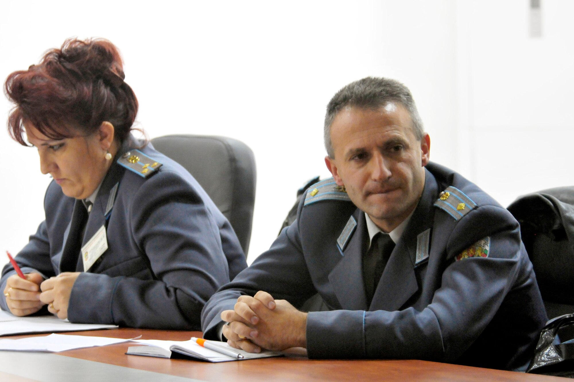 Bulgarian air force officers attend a round-table discussion on the history and future of flight medicine during Exercise Thracian Fall 2010 Oct. 19, 2010, at Graf Ignatievo Air Base, Bulgaria. Airmen from U.S. Air Forces in Europe met for Thracian Fall 2010, an on-site training designed to build the partnership between the U.S. and Bulgarian air force. (U.S. Air Force photo/Tech. Sgt. Michael Voss)