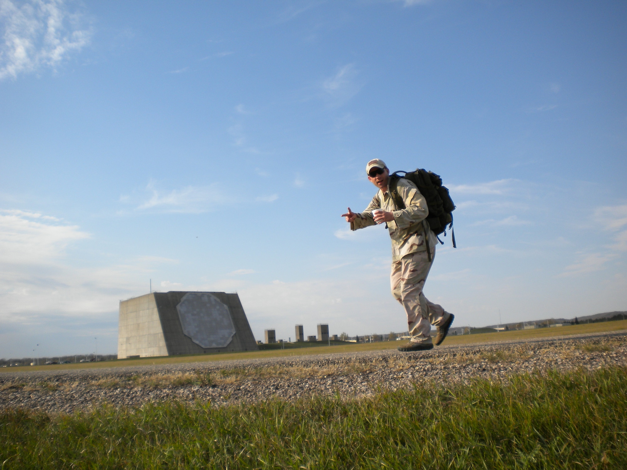 Tech. Sgt. Daniel Harris, NCOIC of Security Forces, rucks the 10K hike with 45 pounds on his back. This was the first year the 10th SWS held the fun run, and they plan to make it an annual event. (U.S. Air Force photo/2nd Lt. Francisco Vazquez)
