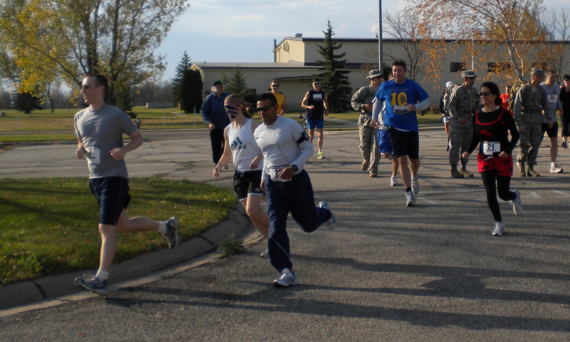 Participants in the 10th Space Warning Squadron’s 10K run begin the race with gusto. This was the first year the 10th SWS held the fun run, and they plan to make it an annual event. (U.S. Air Force photo/2nd Lt. Francisco Vazquez)
