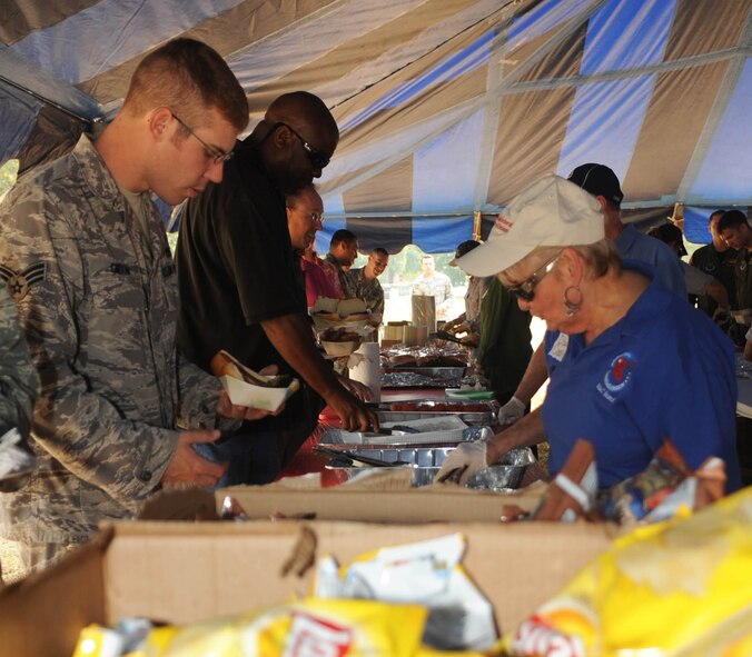 BARKSDALE AIR FORCE BASE, La. -- Military members and their families were invited to join in on some fun Oct. 22 during Celebrate Barksdale. The main event, a base-wide picnic, took place on the lawn of Chapel 1 where food and drinks were served by Military Affairs Council members. There were many booths set up including a children's play area, a face painting booth and balloon animals were made by a clown for children. (U.S. Air Force photo/ Senior Airman Alexandra Boutte) (RELEASED)