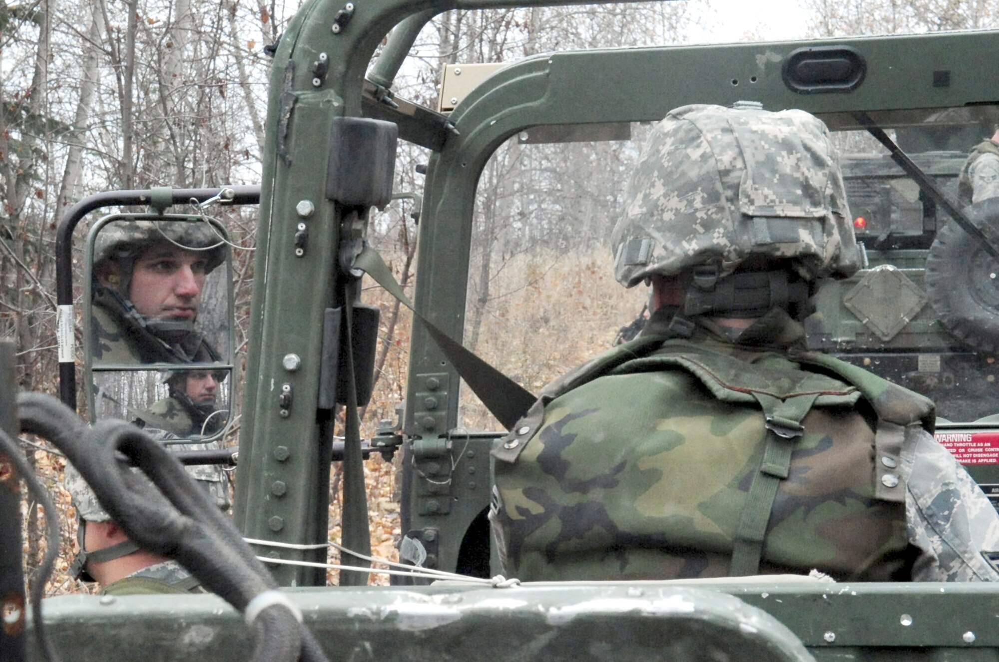 An Airman holds his position during a mock convoy Oct. 7, 2010, at Eielson Air Force Base, Alaska.  Airmen with the 354th Civil Engineer Squadron Explosive Disposal Flight conduct the class to prepare for deployment.  (U.S. Air Force photo/Airman 1st Class Laura Goodgame)