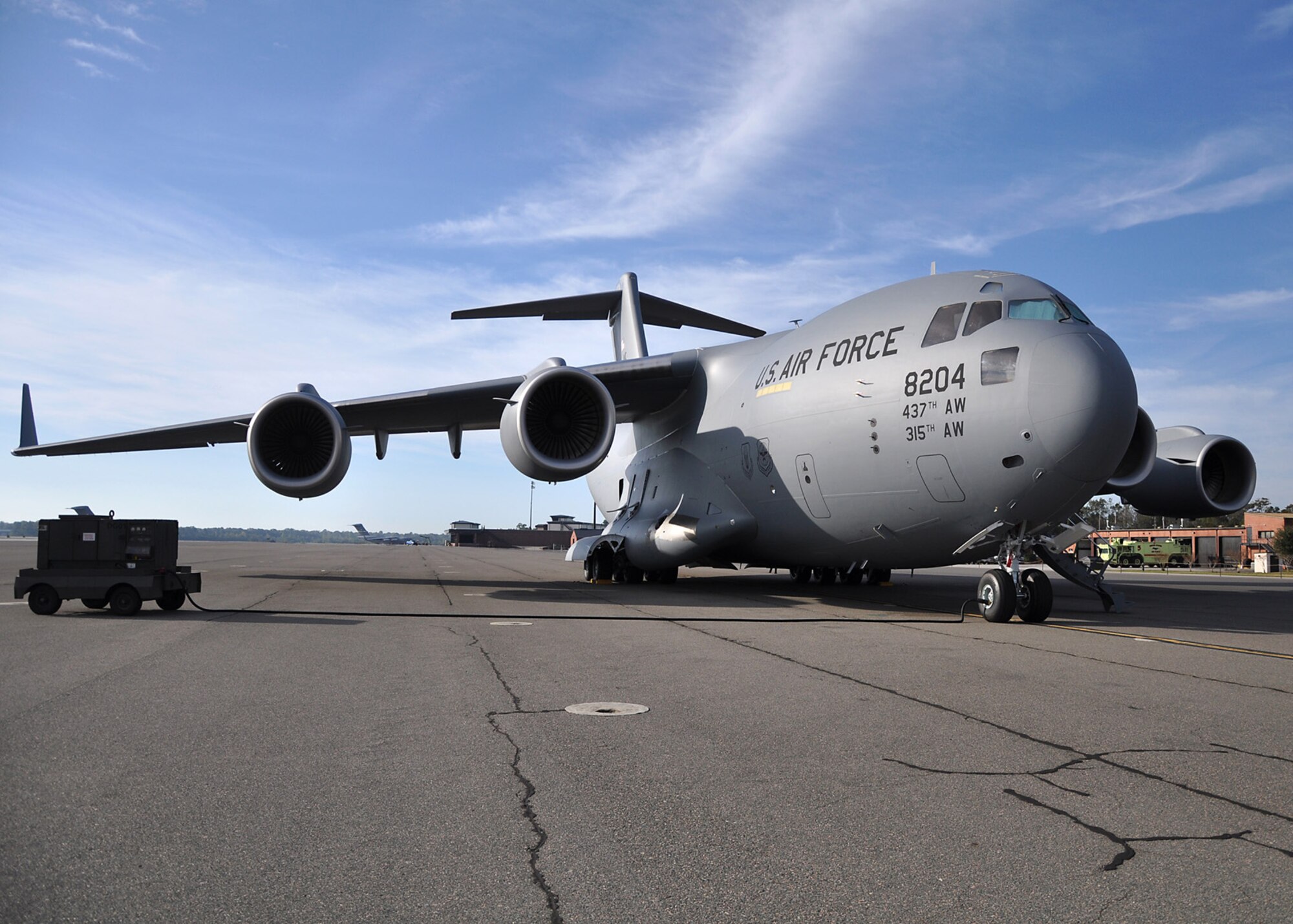 Major General Martin Mazick, vice commander for the Air Force Reserve Command, delivers Joint Base Charleston’s newest C-17 bringing the number assigned to the base to 57.  (U.S. Air Force photo/Staff Sgt. Shane Ellis)