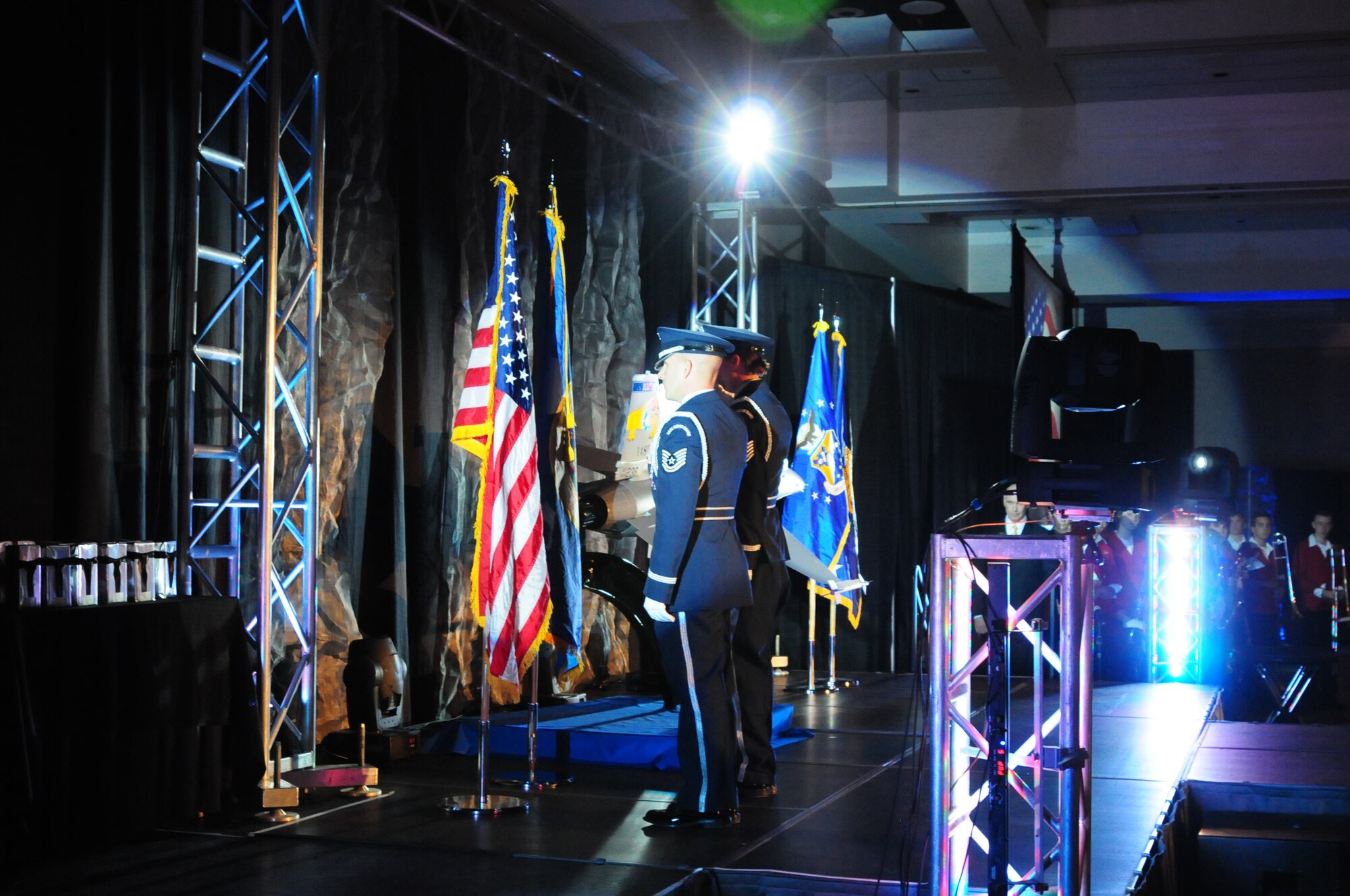 Technical Sergeant Julie Ault and Technical Sergeant Joel Patterson post the colors at the start of the annual Chamber of Commerce Dinner and Gala held on Oct. 21, 2010 at the Duluth Entertainment and Convention Center in Duluth, Minn.  The event featured General Craig McKinley, chief of the National Guard Bureau, as the keynote speaker.  He spoke highly of 148th Fighter Wings accomplishments and the communities' positive support of military members.    (U.S. Air Force photo by SSgt Donald Acton)
