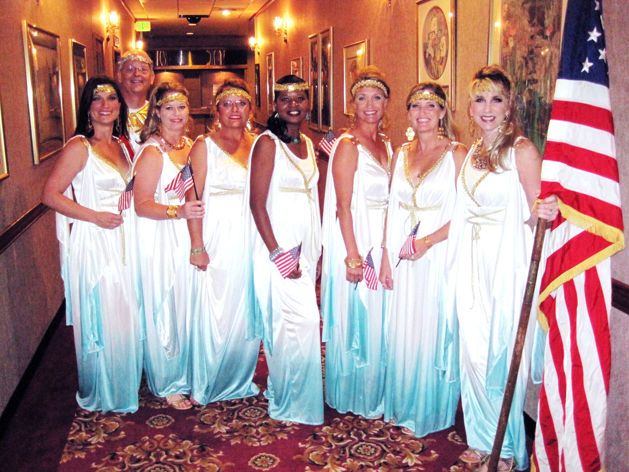 Spouses in togas pose for a picture at the Rocker NCO Club last Saturday for a dining-in event paying tribute to Kadena’s military spouses. Enlisted and officer spouses from more than 20 squadrons dressed up in everything from ‘battle dresses’ and cheerleading uniforms for a night of fellowship and fun. (Courtesy photo)