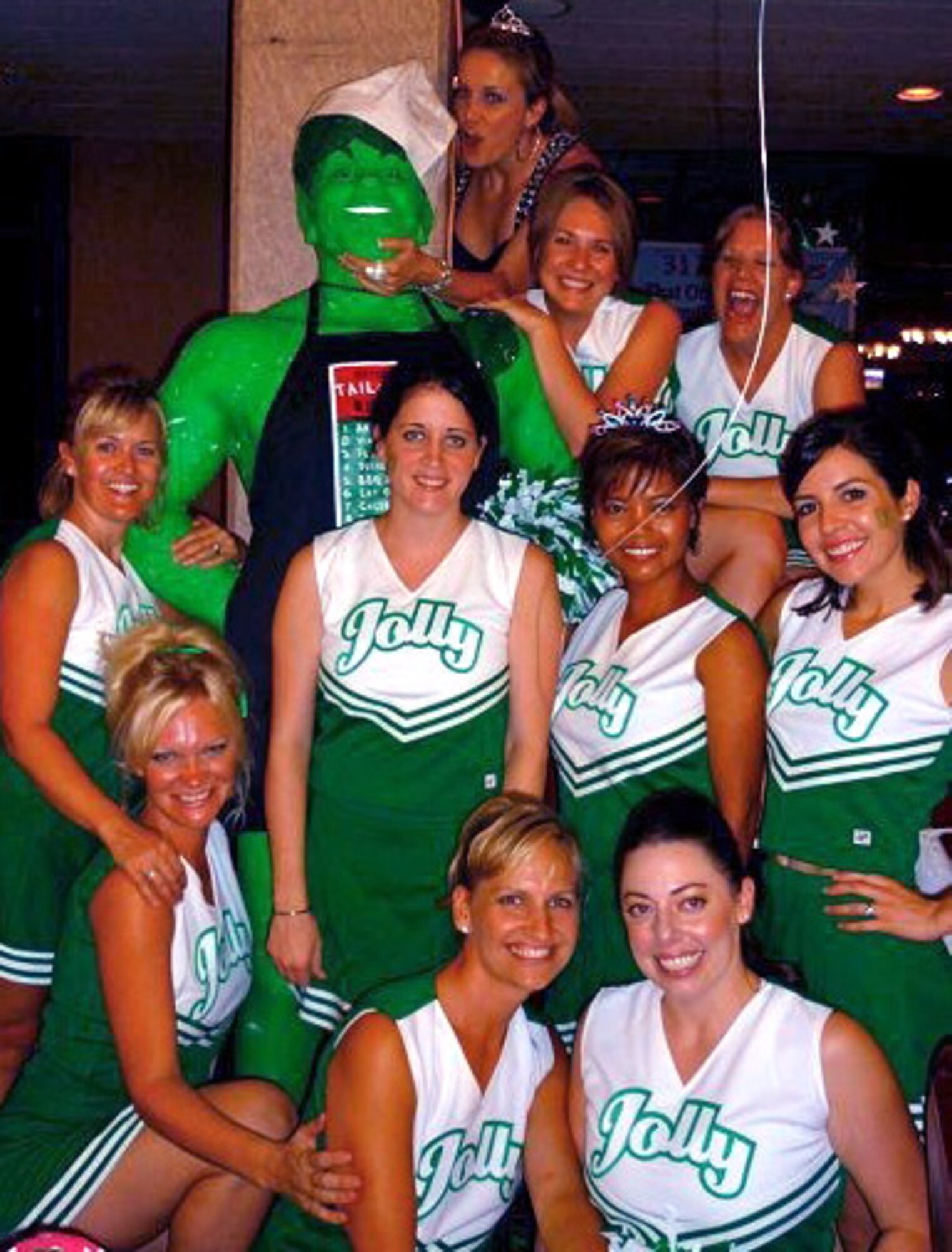 Jolly Green Giants pose for a picture at the Rocker NCO Club last Saturday for a dining-in event paying tribute to Kadena’s military spouses. Enlisted and officer spouses from more than 20 squadrons dressed up in everything from togas, ‘battle dresses’ and cheerleading uniforms for a night of fellowship and fun. (Courtesy photo)