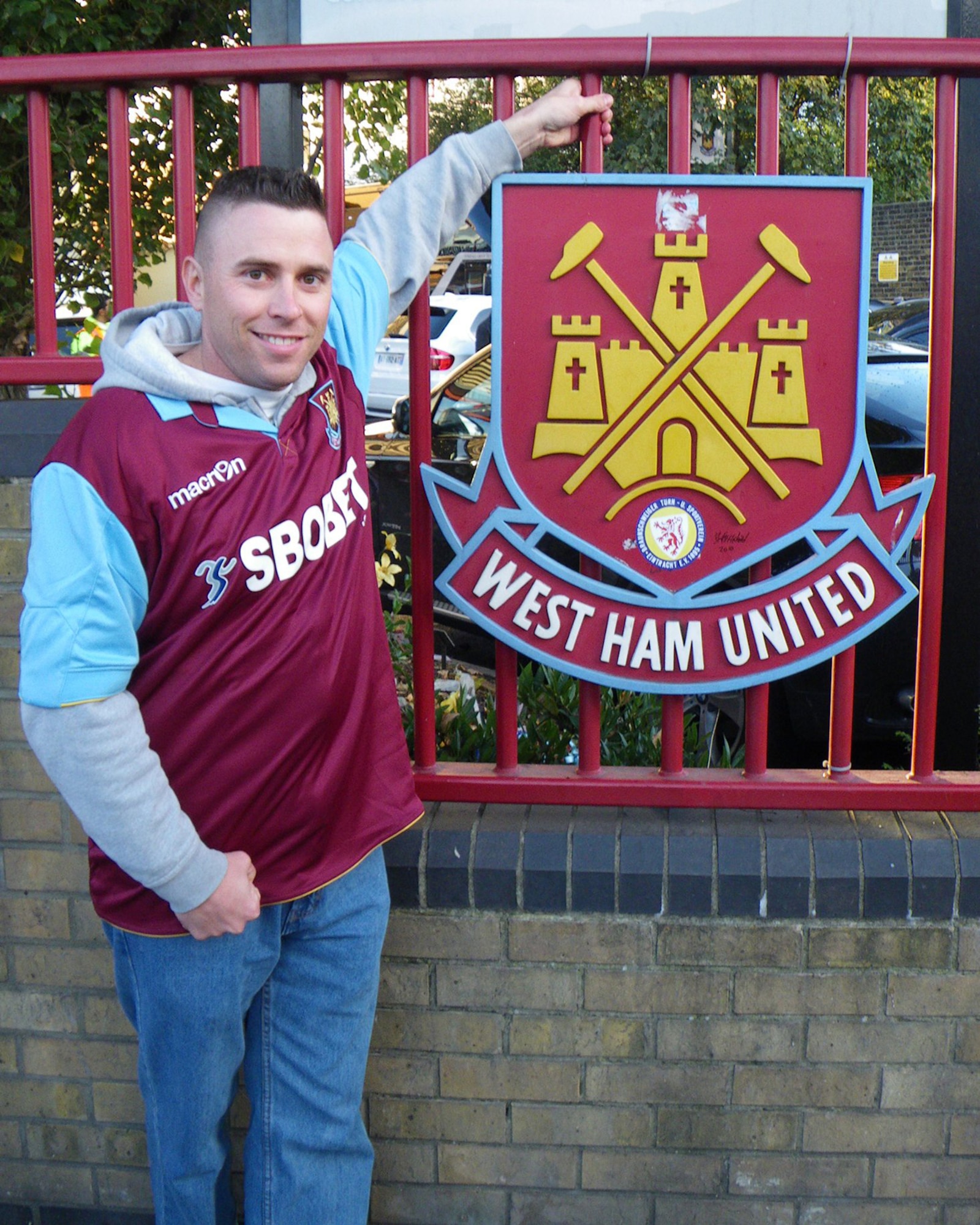 Tech. Sgt. Kevin Wallace, 100th Air Refueling Wing public affairs, stands at the gate of Boleyn Ground in Upton Park, London, home to the West Ham United Football Club Oct 24, 2010. It was the American servicemember's first English soccer game. (U.S. Air Force photo/Danny Reed)