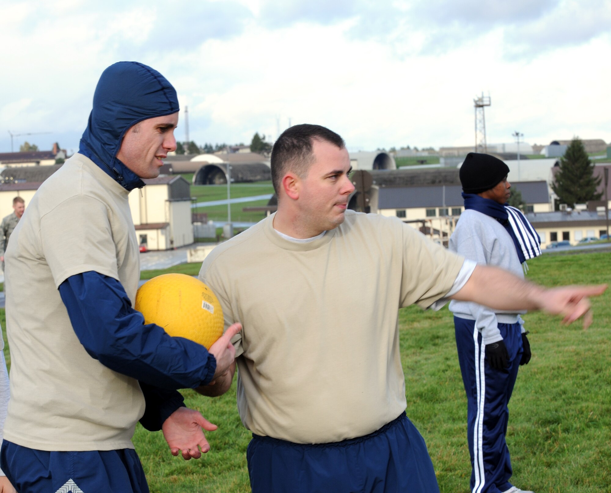 SPANGDAHLEM AIR BASE, Germany – Staff Sgt. Jason Hancock, 52nd Operations Support Squadron, assigns a position on the field to teammate Senior Airman Frederick Hough, 52nd Security Forces Squadron Airman Leadership School student, while playing the game Icarus. The game was introduced to the ALS class as an opportunity to teach the young enlisted members about air and space principles along with the fundamentals of leadership, followership and teamwork. (U.S. Air Force photo/Airman 1st Class Matthew B. Fredericks)