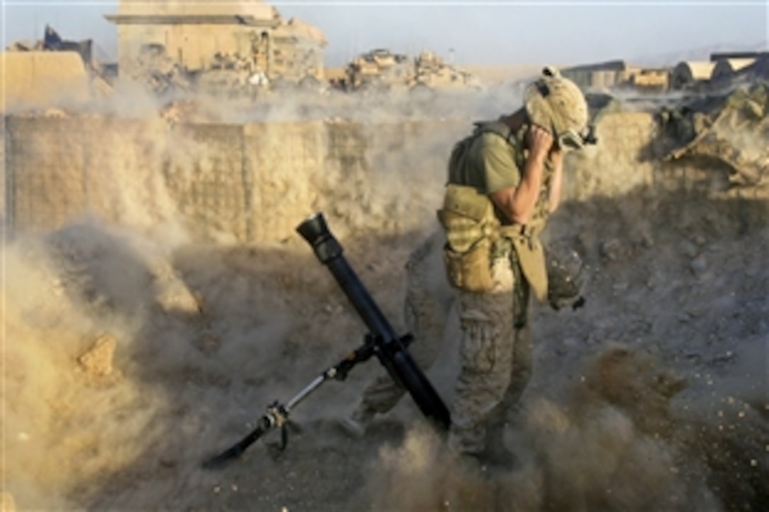 U.S. Marines fire a mortar round during combat operations on Forward Operating Base Nolay, Afghanistan, Oct. 19, 2010. The Marines are assigned to the 3rd Battalion, 5th Marine Regiment, Regimental Combat Team 2.
