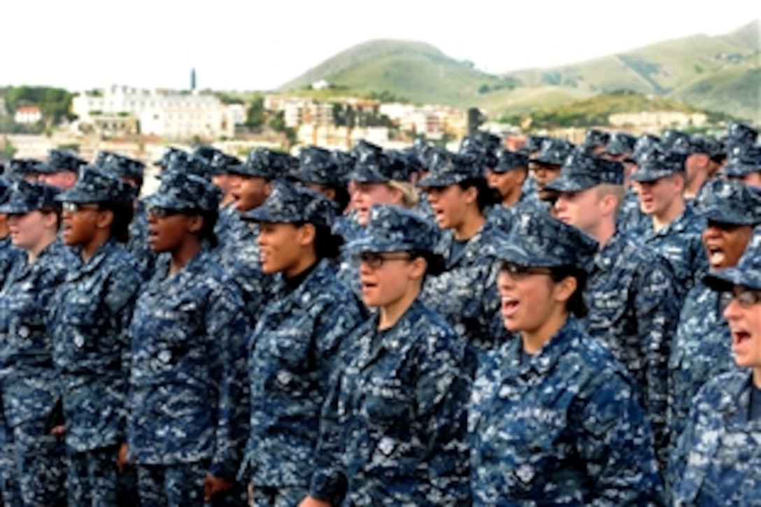 More than 150 U.S. Navy sailors stationed aboard the USS Mt. Whitney, docked in Geata, Italy, yell a "Hooyah" for Master Chief Petty Officer of the Navy Rick D. West before an all hands call, Oct. 22, 2010. 