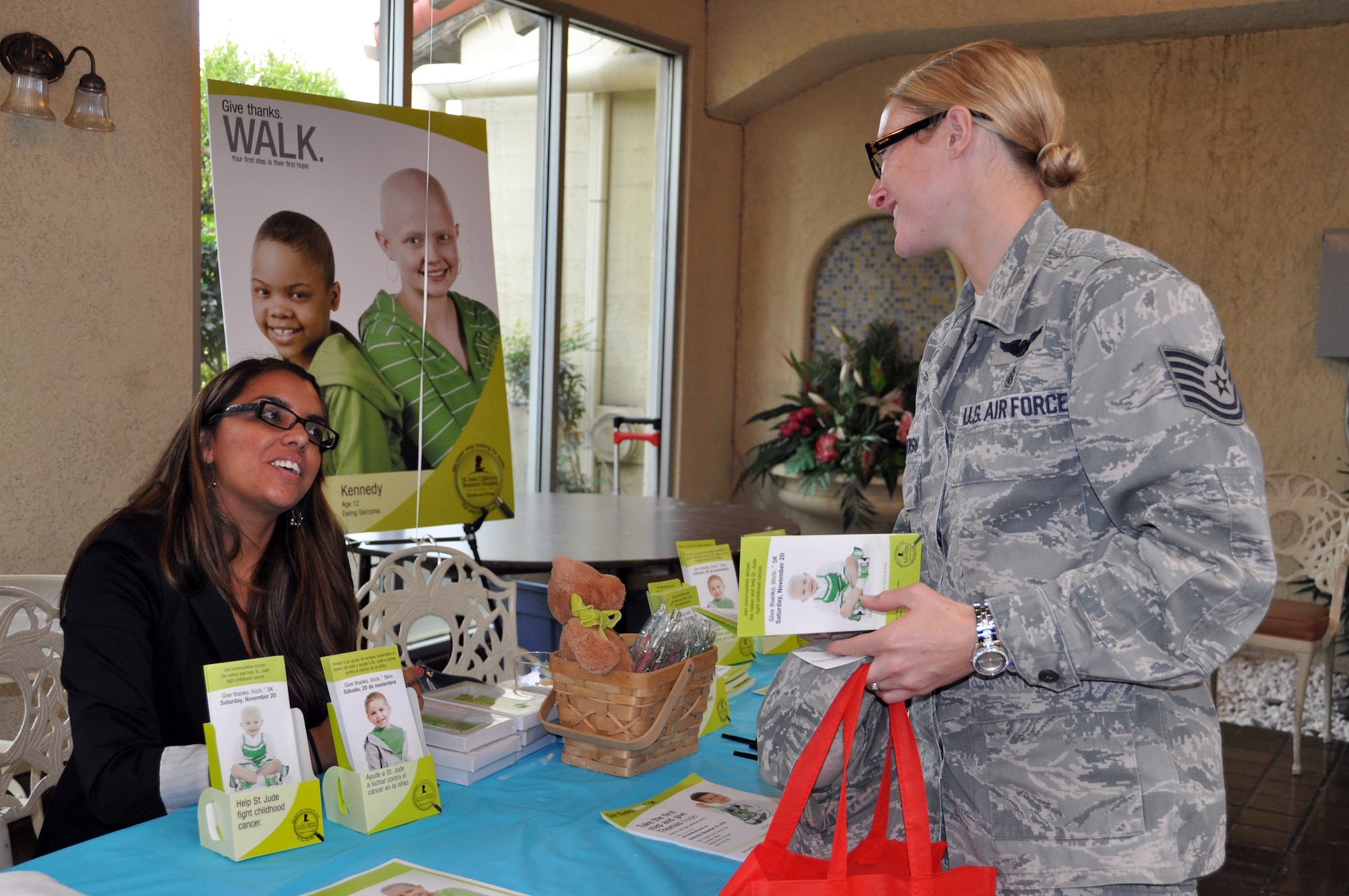 Tech. Sgt. Lyndsey Wisniewski talks to Beatriz Barragan, event marking manager at St. Jude Children’s Research Hospital, during the CFC kickoff fair held Oct. 19 at the Hap Arnold Club. Sixteen local nonprofit organizations set up informational displays at the event. This year’s CFC deadline is Nov. 21. (U.S. Air Force photo by Linda Welz)
