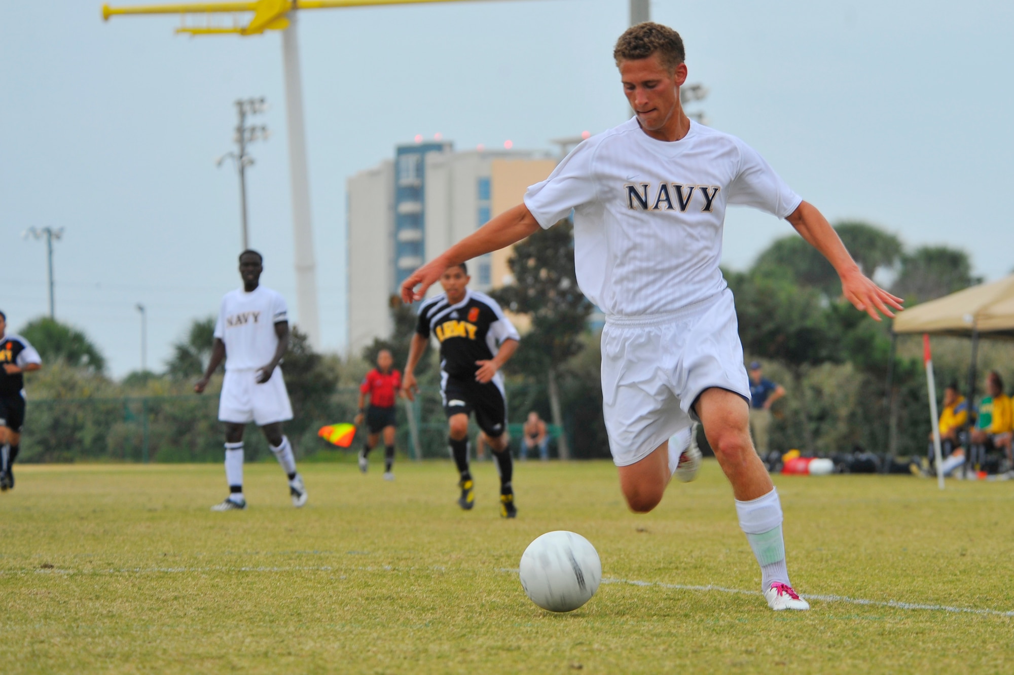U.S. Navy Seaman Austin Meier prepares to kick the ball during the Armed Forces Men's Soccer Championship match against the U.S. Army at Morgan Sports Complex, Destin, Fla., Oct. 24, 2010.  The top players from the tournament will be chosen to represent the US in the International Military Sports Competition. Seaman Meier is assigned to Carrier Airborne Early Warning Squadron ONE ONE TWO, Point Mugu, Calif.  (DoD photo by U.S. Air Force Senior Airman Sheila deVera/RELEASED)
