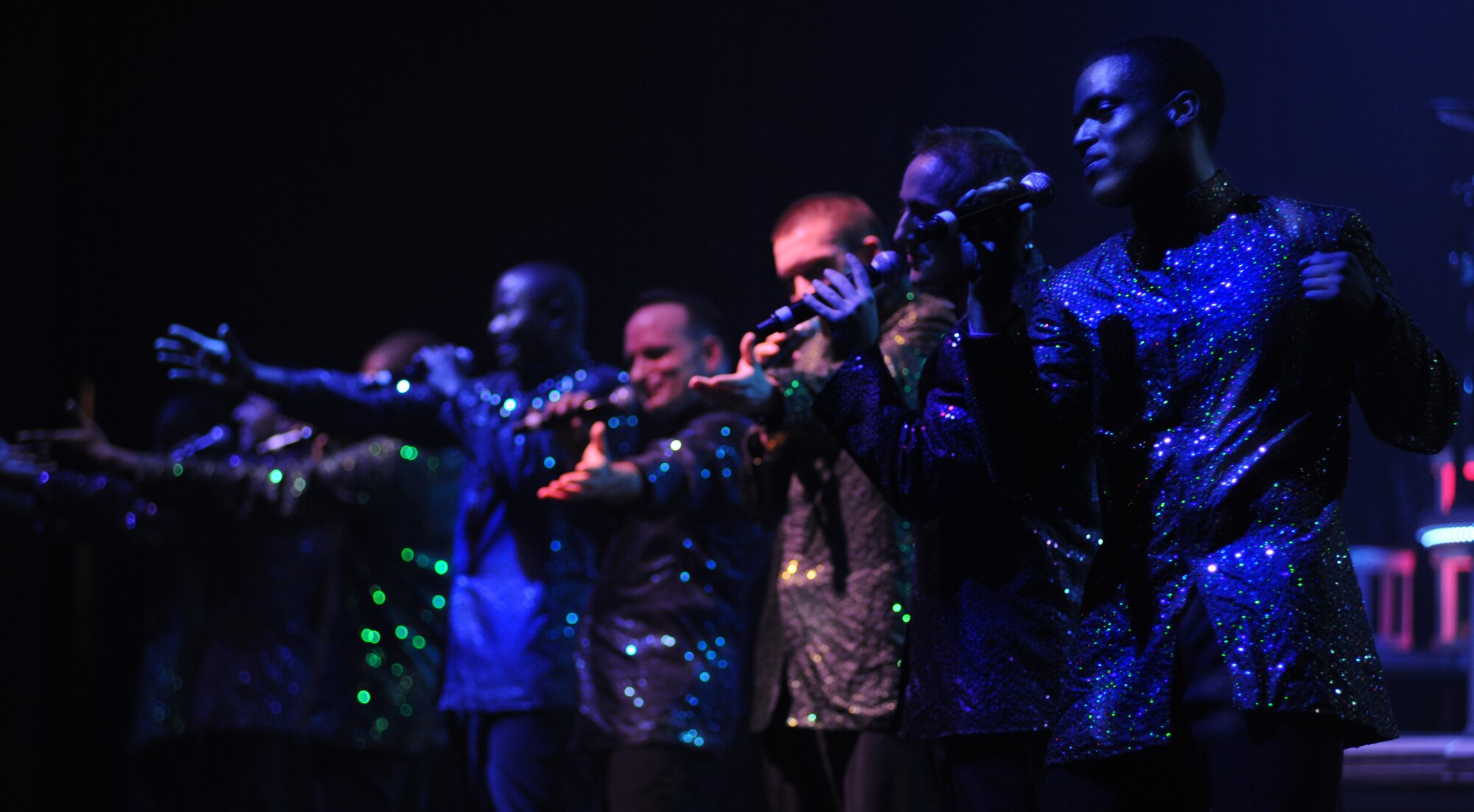 The men of Tops In Blue serenade the audience during a performance at the North Charleston Performing Arts Center Oct. 21, 2010. Tops In Blue has performed for audiences of thousands of people, such as the Daytona 500. (U.S. Air Force Photo/Airman 1st Class Lauren Main)