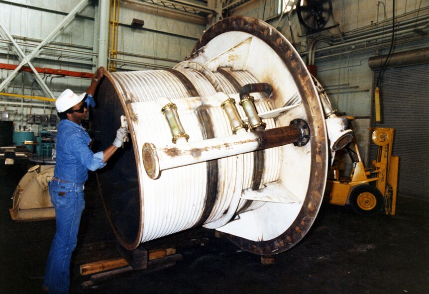 Maverick Mosley, a boilermaker journeyman in 1992, prepares a diffuser for installation at the J-1 altitude test cell for medium to large turbine engines at AEDC. This diffuser is used to simulate a jet engine’s air intake during ground testing. (File photo)

