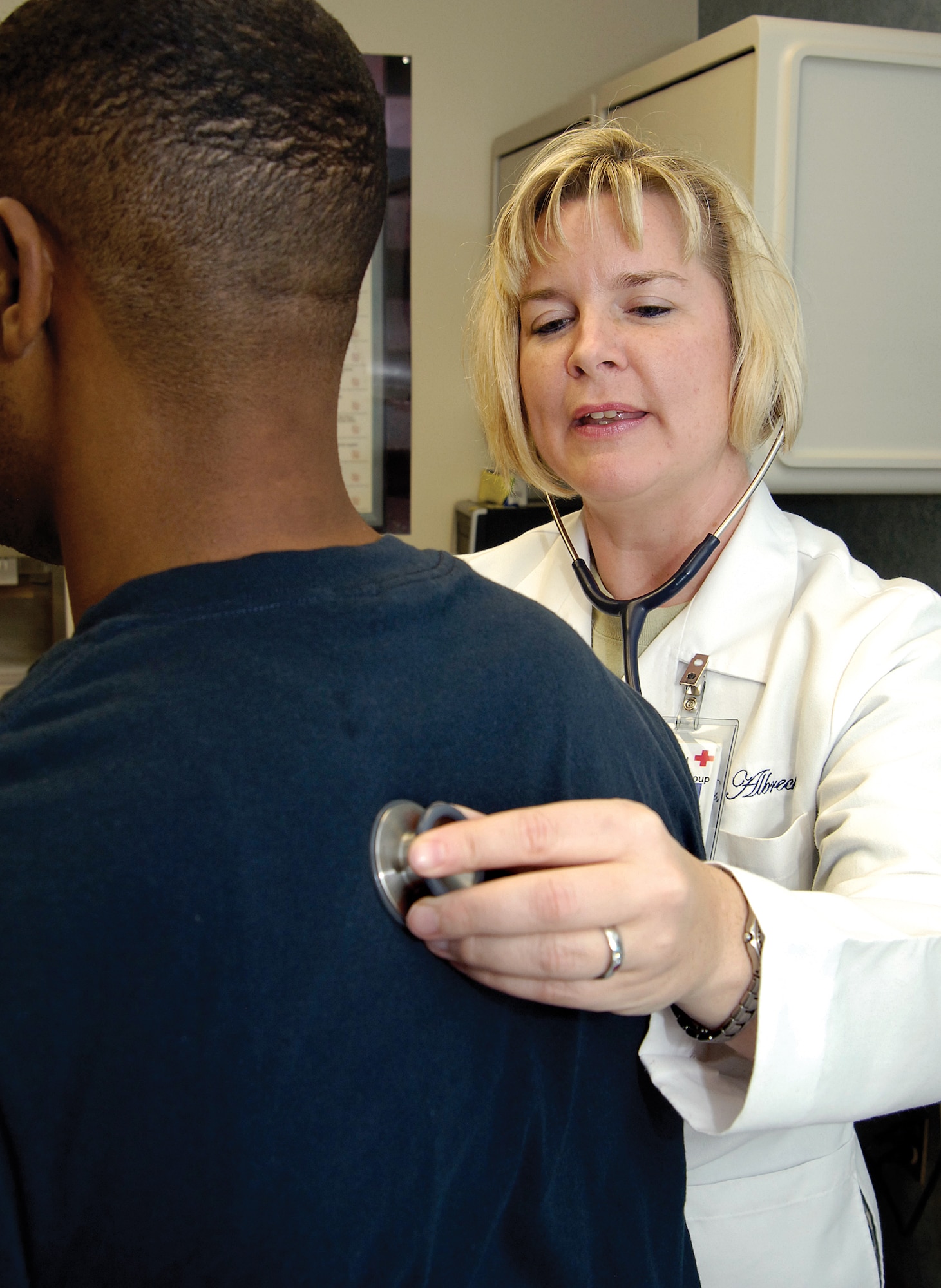 Dr. (Maj.) Angela Albrecht, 72nd Medical Operations Support Medicine Clinic director, sees a patient in Tinker’s family medicine clinic. (Air Force photo by Margo Wright)
