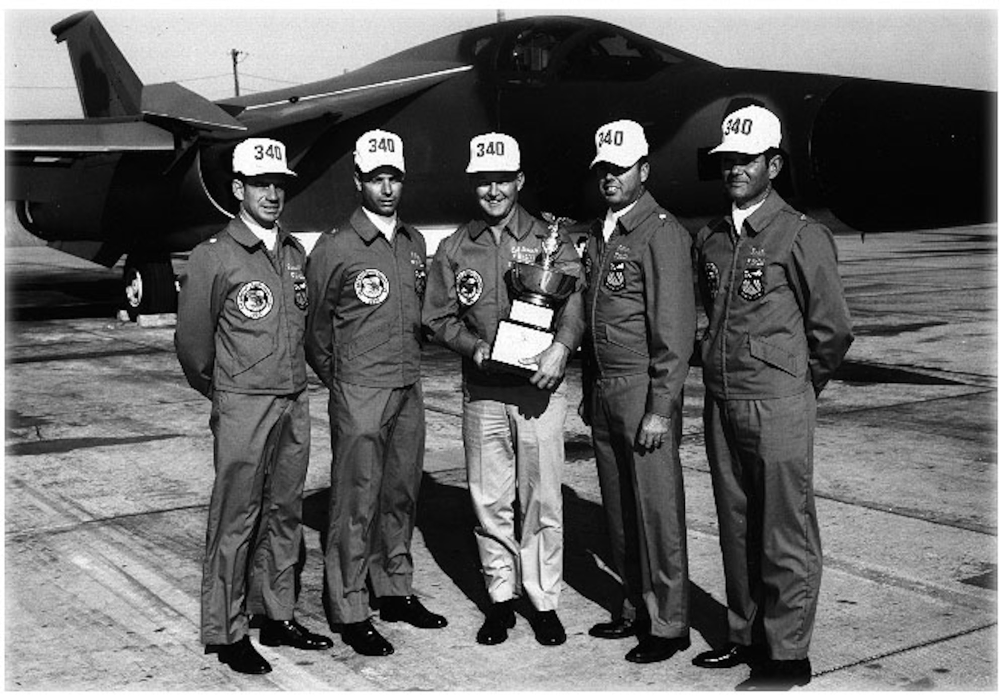 MCCOY AIR FORCE BASE, Fla. - The 17th Bombing and Navigation Competition saw the first appearance of FB-111s; the re-appearance of tanker squadrons; criteria for the Fairchild and Saunders Trophies was changed; and the Mathis Trophy was awarded for the first time. The best bombing honors went to the 340th Bomb Group's, from Carswell Air Force Base, Texas. The Carswell AFB unit placed second for the Mathis Trophy, awarded to the top bomber unit based on combined results in bombing and navigation, and second for the Navigation Trophy. Accepting the trophy in 1970 are (left to right) Lt. Col. R. S. Russell; Maj. A. R. Ely; Col. K. J. Green, 340th BG commander; Lt. Col. J. S. Lothar and Maj. B. R. Seals. (Courtesy photo)