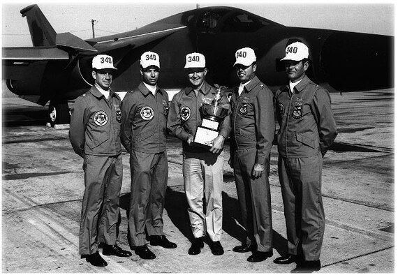 MCCOY AIR FORCE BASE, Fla. - The 17th Bombing and Navigation Competition saw the first appearance of FB-111s; the re-appearance of tanker squadrons; criteria for the Fairchild and Saunders Trophies was changed; and the Mathis Trophy was awarded for the first time. The best bombing honors went to the 340th Bomb Group's, from Carswell Air Force Base, Texas. The Carswell AFB unit placed second for the Mathis Trophy, awarded to the top bomber unit based on combined results in bombing and navigation, and second for the Navigation Trophy. Accepting the trophy in 1970 are (left to right) Lt. Col. R. S. Russell; Maj. A. R. Ely; Col. K. J. Green, 340th BG commander; Lt. Col. J. S. Lothar and Maj. B. R. Seals. (Courtesy photo)
