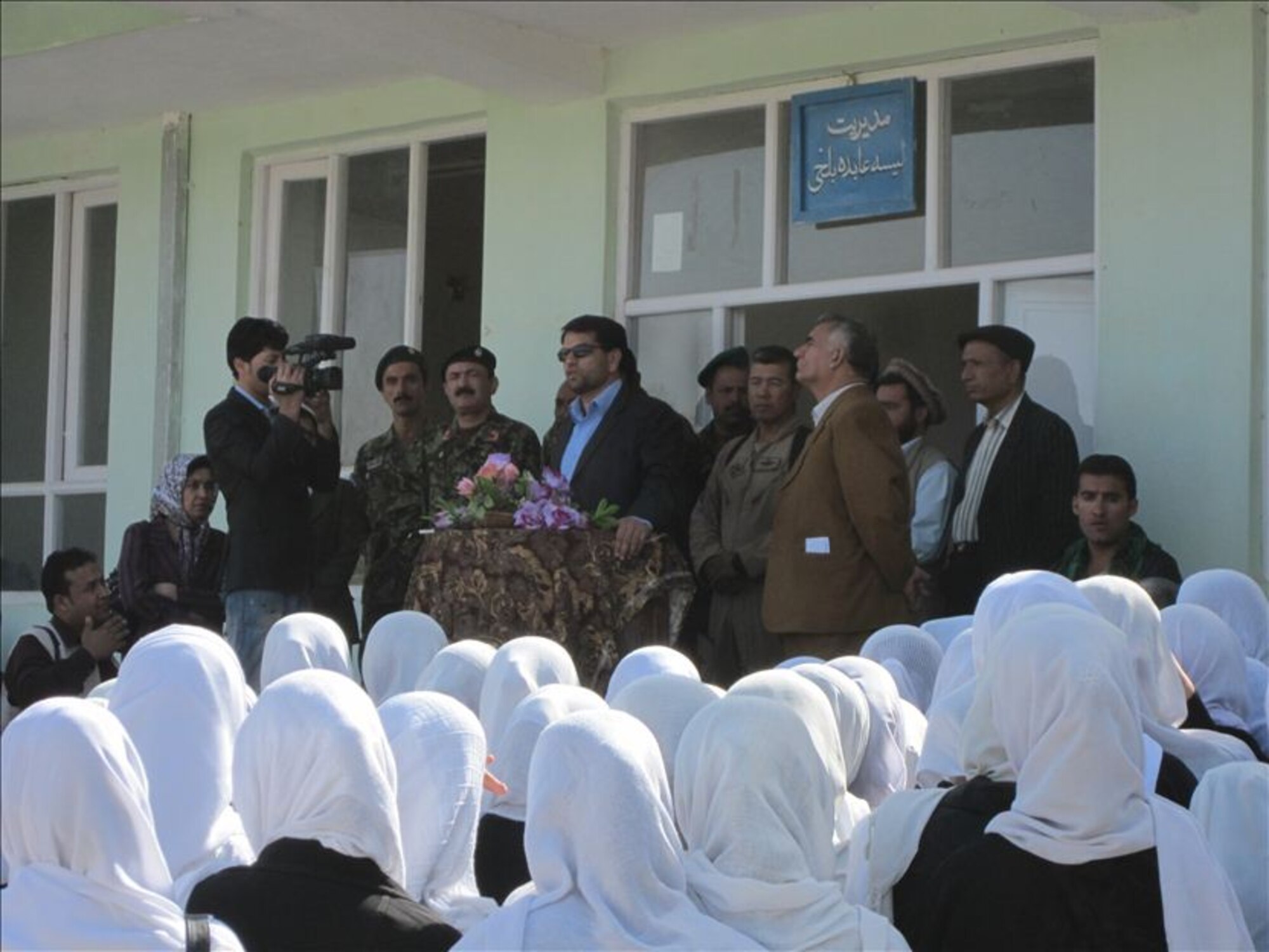MAZAR-E-SHARIF, Afghanistan - Afghan Air Force and NATO Air Training Command – Afghanistan Detachment 3 members distributed 1,500 radios to two suburb girls’ schools in Deh Dadi village near Mazar-e-Sharif on Sat., Oct. 23rd. (U.S. Air Force photo/RELEASED).