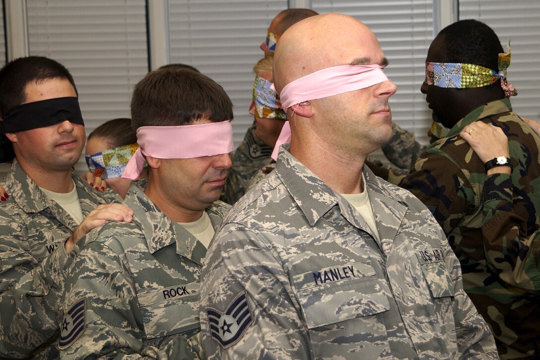 McENTIRE JOINT NATIONAL GUARD BASE, S.C. - NCOs from the 169th Fighter Wing here participate in a "Blind Trust Walk" during a leadership development course held at Fort Jackson, Oct. 2-3, 2010.  (U.S. Air Force photo by Tech. Sgt. Stephen Hudson/Released)