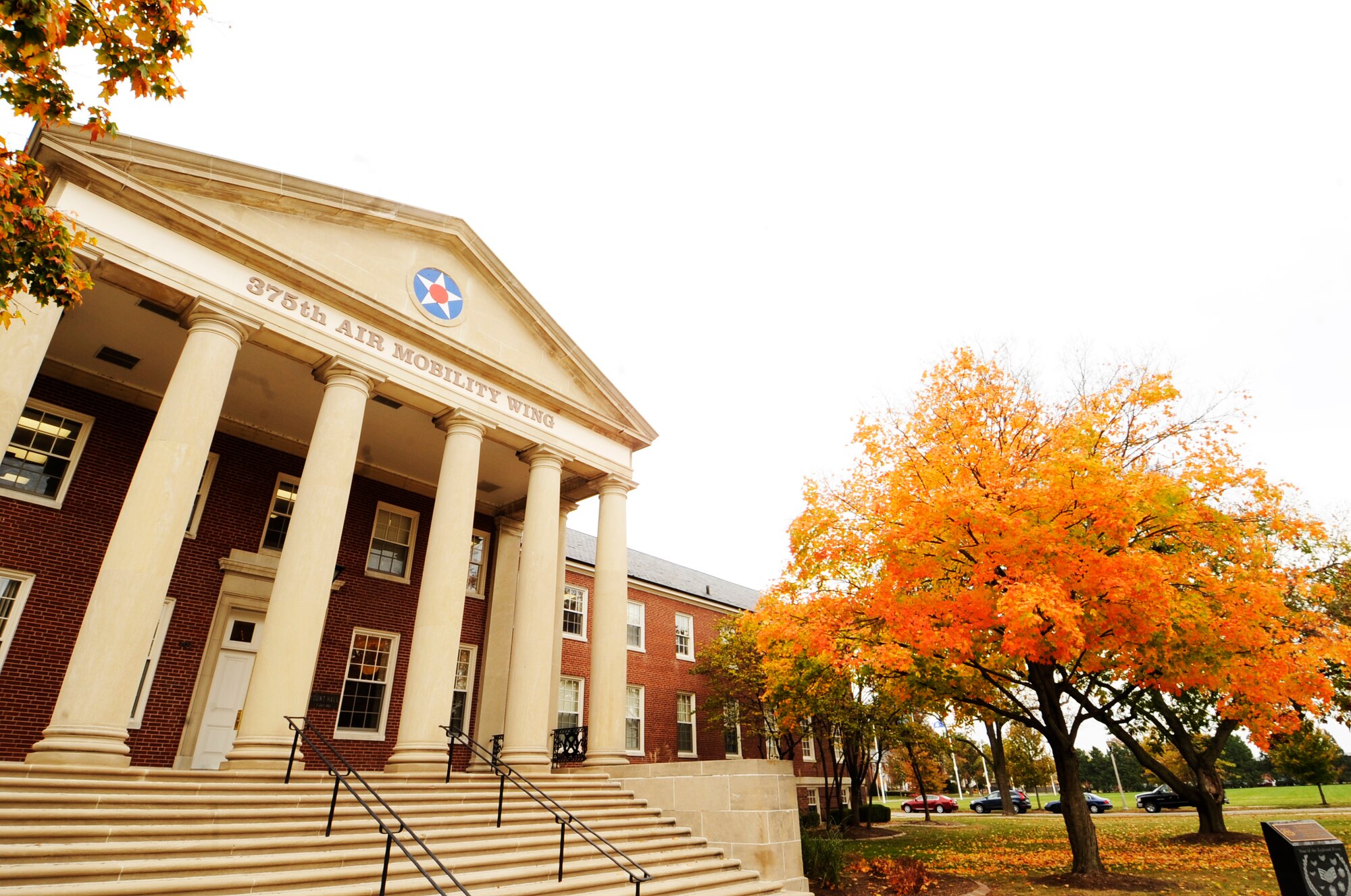 SCOTT AIR FORCE BASE, Ill. – The 375th Air Mobility Wing headquarters building is surrounded by multi-colored trees as the base reaches the peak of the Fall season Oct. 25. There is a short time frame where Scott is transformed into a picturesque fall landscape and people can be found outside enjoying the colors and weather while they last. (U.S. Air Force photo/ Staff. Sgt. Ryan Crane)