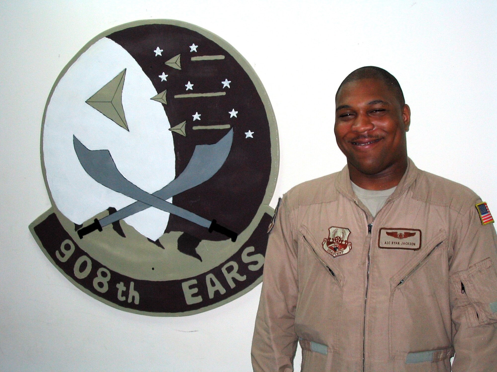 Airman 1st Class Ryan Jackson, 908th Expeditionary Air Refueling Squadron KC-10 Extender boom operator, poses at an undisclosed location in Southwest Asia. Airman Jackson supported American Gold Star Mothers, Inc. here before returning to his home station Joint Base McGuire-Dix-Lakehurst, N.J. (Courtesy photo)