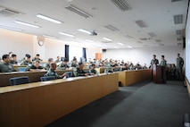 KWANGJU AIR BASE, Republic of Korea -- Participants in the 2010 Max Thunder exercise listen to a pre-flight briefing before takeoff Oct. 21. More than 170 Wolf Pack Airmen participated in the fourth annual exercise at Kwangju Air Base Oct. 15-22. (U.S. Air Force photo/Master Sgt. Jason Wilkerson)