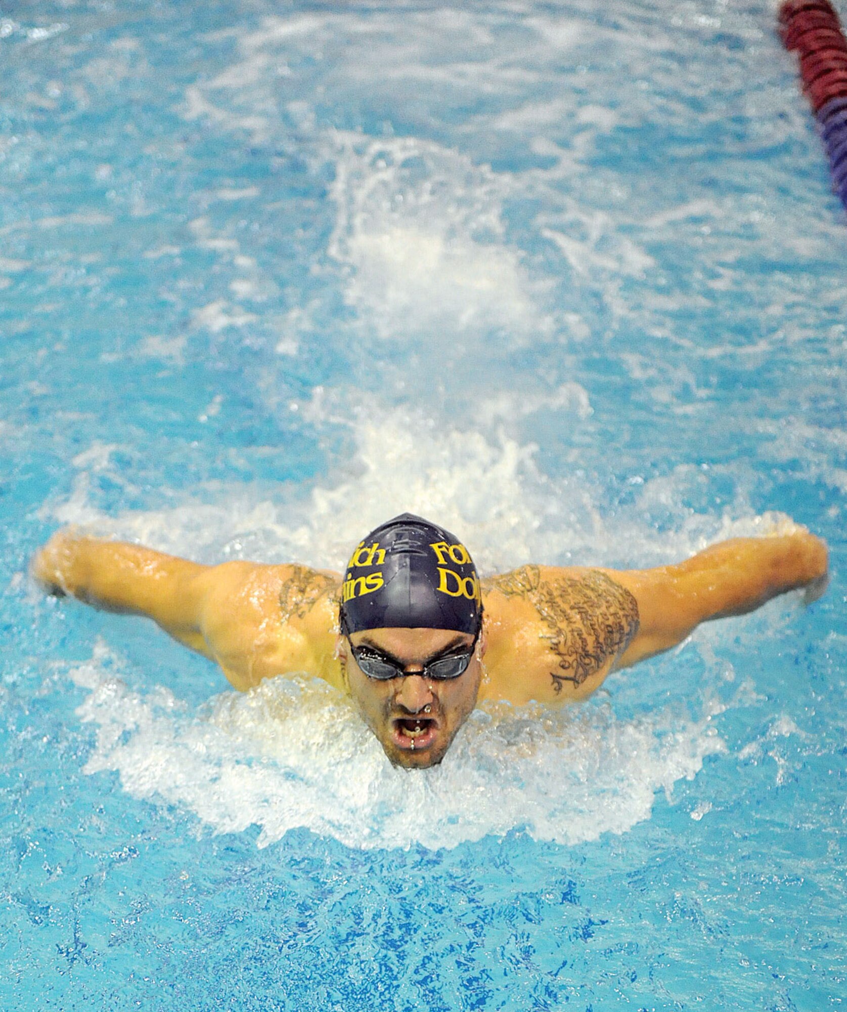 USAG swimmer Matt Oberlander competes in the men’s 100-yard butterfly at the Oct. 21 swim meet.  (U.S. Air Force photo/John Pennell)