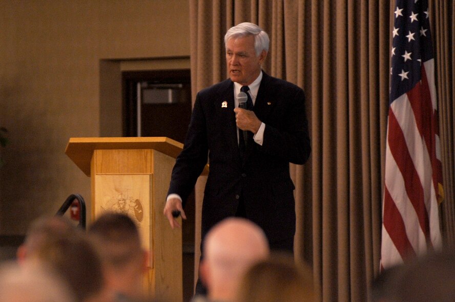 Retired Lt. Col. Barry Bridger, North Vietnam Prisoner of War survivor, speaks about the torture he endured while being a POW for six years in the Hanoi Hilton Prison Camp Oct. 27 at the Northern Lights Club on Grand Forks AFB.  Colonel Bridger was in the Grand Forks area sharing his POW story with the local community; he also travels around the world sharing his experience. (U.S. Air Force photo by Senior Airman Amanda N. Stencil)